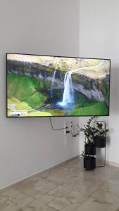 A television and/or entertainment centre at Sfakion 6 apartment