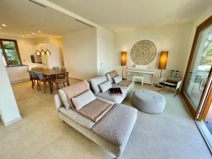 A seating area at Cokkinis villa with garden overlooking the sea