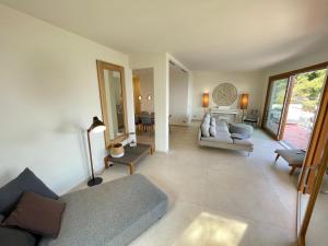 A bed or beds in a room at Cokkinis villa with garden overlooking the sea