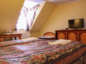 TV a/nebo společenská místnost v ubytování Offi Haz Hotel