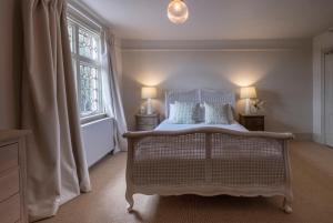 Een bed of bedden in een kamer bij The Ship At Dunwich