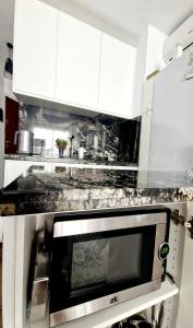 Kuchyňa alebo kuchynka v ubytovaní Moderno Apartamento con Vistas al Mar Calpe
