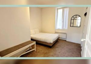 Posteľ alebo postele v izbe v ubytovaní Spacieux T3 au pied des Thermes