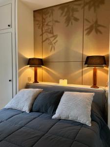 A bed or beds in a room at Cokkinis villa with garden overlooking the sea