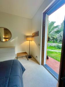 A bed or beds in a room at Cokkinis villa with garden overlooking the sea