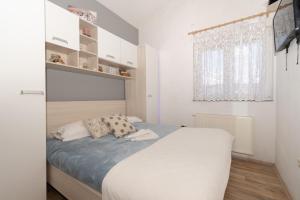 Postel nebo postele na pokoji v ubytování Villa Bravic