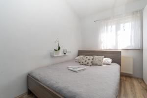 Postel nebo postele na pokoji v ubytování Villa Bravic