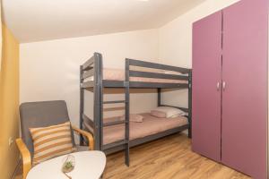 Postel nebo postele na pokoji v ubytování Villa Bravic + 36 fotografií