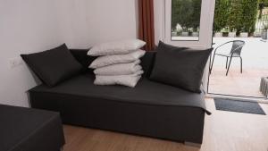 Apartamenty i Pokoje Tornado的休息区