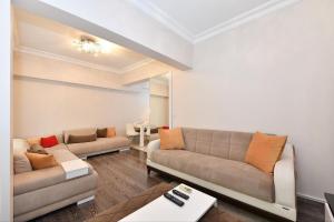 Posezení v ubytování 2 BEDROOM APARTMENT EKMEK Şişli - ISTANBUL