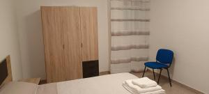Łóżko lub łóżka w pokoju w obiekcie El Hogar de Juan Ramón