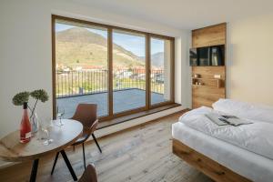 Nespecifikovaný výhled na hory nebo výhled na hory při pohledu z apartmánu + 9 fotografií