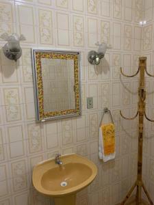 Ett badrum på Casa da Fonte Hospedaria