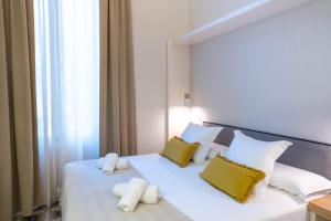 Posteľ alebo postele v izbe v ubytovaní Feelathome Casa Bertrand