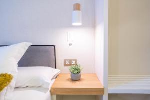 Posteľ alebo postele v izbe v ubytovaní Feelathome Casa Bertrand + 37 fotografií