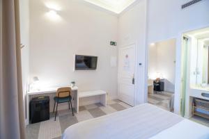 Posteľ alebo postele v izbe v ubytovaní Feelathome Casa Bertrand