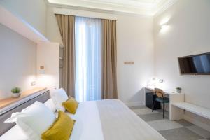Posteľ alebo postele v izbe v ubytovaní Feelathome Casa Bertrand
