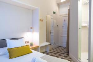 Posteľ alebo postele v izbe v ubytovaní Feelathome Casa Bertrand