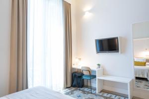 Posteľ alebo postele v izbe v ubytovaní Feelathome Casa Bertrand