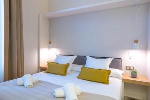 Posteľ alebo postele v izbe v ubytovaní Feelathome Casa Bertrand