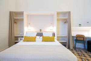 Posteľ alebo postele v izbe v ubytovaní Feelathome Casa Bertrand