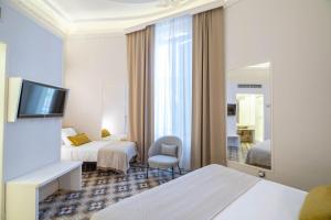 Posteľ alebo postele v izbe v ubytovaní Feelathome Casa Bertrand