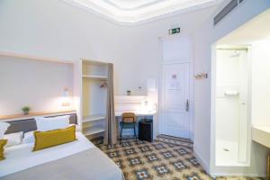 Posteľ alebo postele v izbe v ubytovaní Feelathome Casa Bertrand