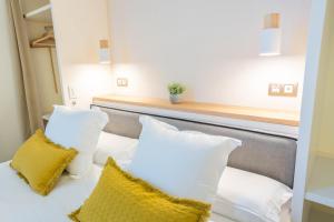 Posteľ alebo postele v izbe v ubytovaní Feelathome Casa Bertrand