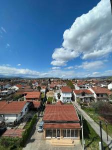 arial view of a town with houses and roofs at Viktorija's Apartment in Gevgelija