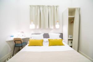Posteľ alebo postele v izbe v ubytovaní Feelathome Casa Bertrand