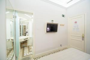 Posteľ alebo postele v izbe v ubytovaní Feelathome Casa Bertrand