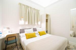 Posteľ alebo postele v izbe v ubytovaní Feelathome Casa Bertrand