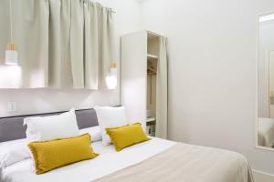 Posteľ alebo postele v izbe v ubytovaní Feelathome Casa Bertrand