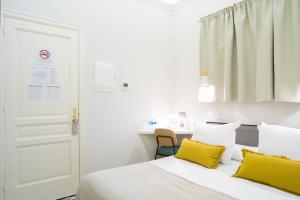 Posteľ alebo postele v izbe v ubytovaní Feelathome Casa Bertrand