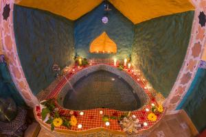 an overhead view of a bath tub with lights in a room at Casas Cueva Cazorla in Hinojares