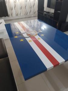 a table with an american flag painted on it at Bellamy in Porto Novo