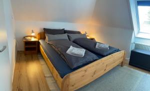 Katil atau katil-katil dalam bilik di Ferienhaus Nissen-Hütte
