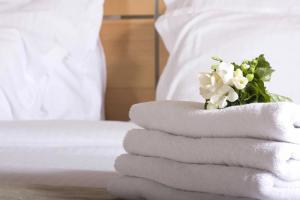 Postel nebo postele na pokoji v ubytování Trugo Luxury Rooms