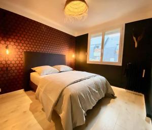Posteľ alebo postele v izbe v ubytovaní Appartement chaleureux entre Zola et Procé.