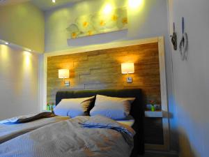 Llit o llits en una habitació de Ferienhaus Villa Rosi