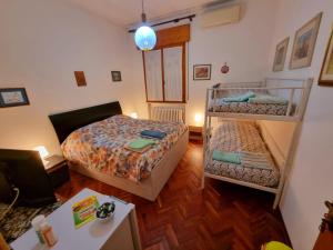 Postel nebo postele na pokoji v ubytování Casa di Igor