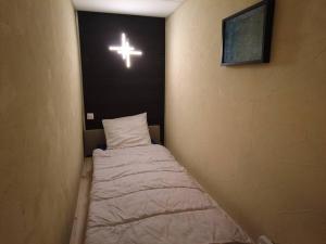 Posteľ alebo postele v izbe v ubytovaní Le Jardin d'Eden -Appartement de charme avec Sauna, Hammam, spa