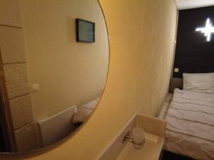 Posteľ alebo postele v izbe v ubytovaní Le Jardin d'Eden -Appartement de charme avec Sauna, Hammam, spa