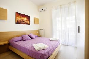Posteľ alebo postele v izbe v ubytovaní Affittacamere Nansen