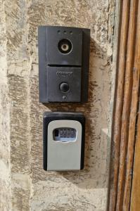 a electrical outlet on a stone wall at Spacious 4-Bedrooms Townhouse in Tas-Sliema in Sliema