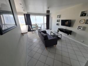 Posedenie v ubytovaní Grand appartement lumineux
