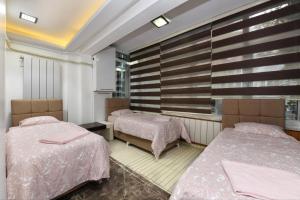 Postel nebo postele na pokoji v ubytování 2 BEDROOM APARTMENT At KALE Şişli - ISTANBUL