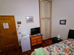 Postel nebo postele na pokoji v ubytování Casa di Igor