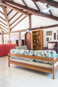 A seating area at Aconchegante casa prox. a praia em Geribá/Búzios