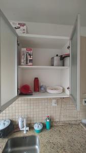 a kitchen with a sink and a counter top at Apt(2) no centro de VR tudo perto até 7 pessoas in Volta Redonda
